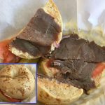 The inside of a "Happy Jack" sandwich on a garlic bagel